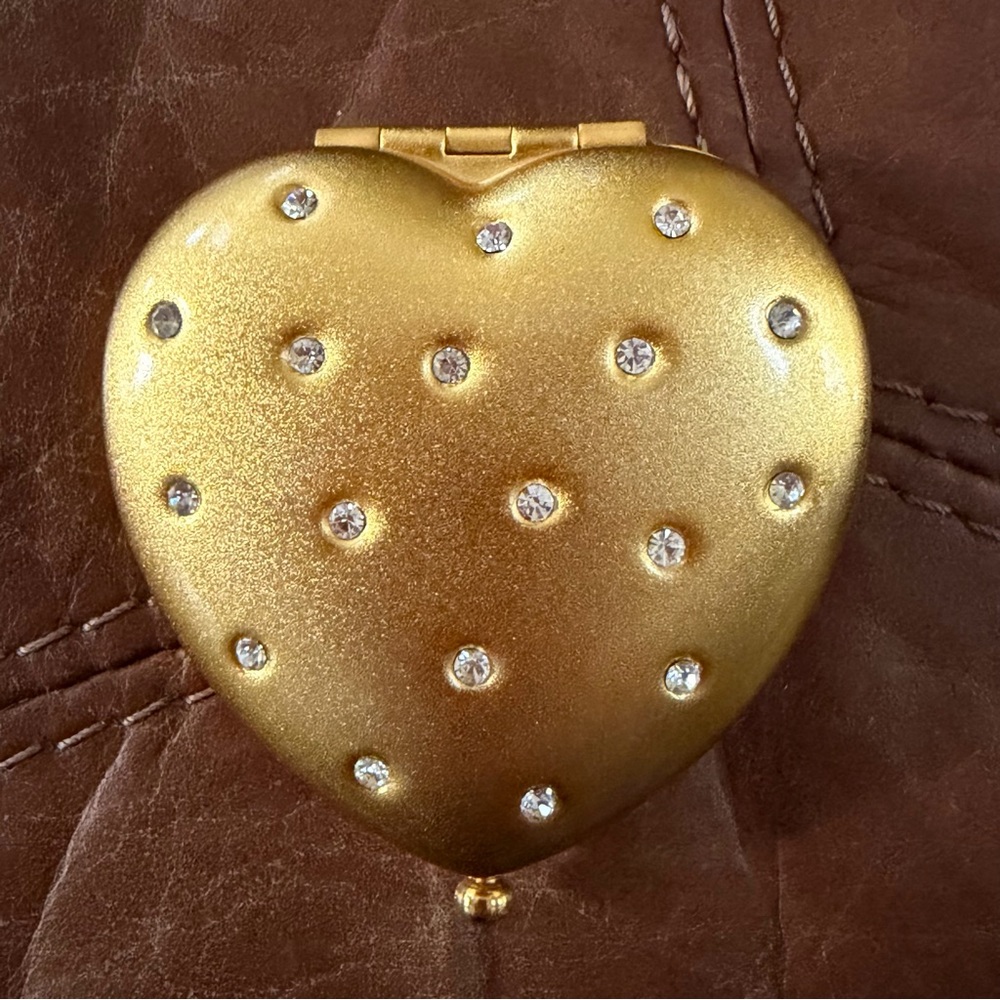 Beautiful heart shaped mirror and powder box
